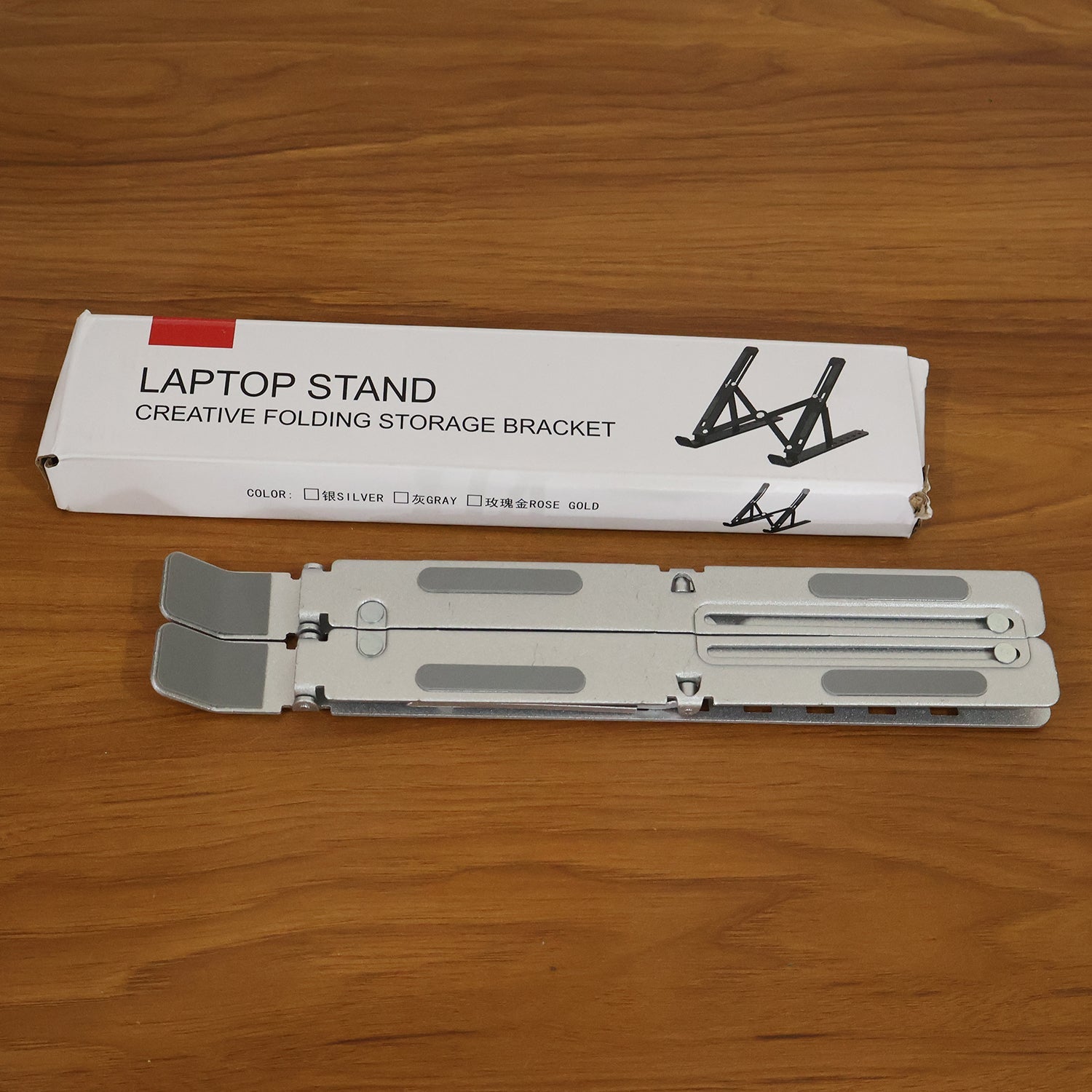 Adjustable Laptop Stand – Ergonomic Foldable Design for Desk Use